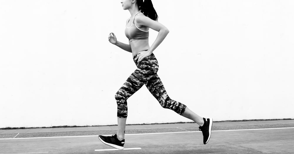 woman-running-fast-on-a-track-outdoors-2026-01-07-23-24-44-utc